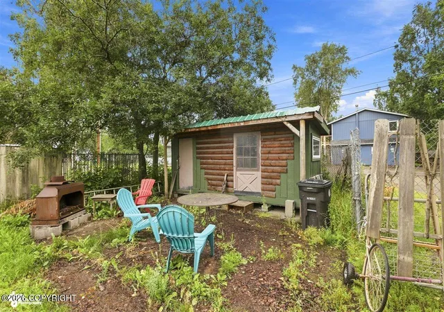 Photo 2 of Single family home for sale at 1335 Ingra St, Anchorage, AK 99501 | MLS# 26-10509 | Listing updated on 2026-08-24
