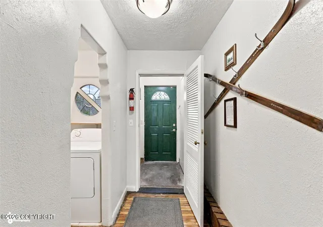 Photo 3 of Single family home for sale at 1335 Ingra St, Anchorage, AK 99501 | MLS# 26-10509 | Listing updated on 2026-09-20