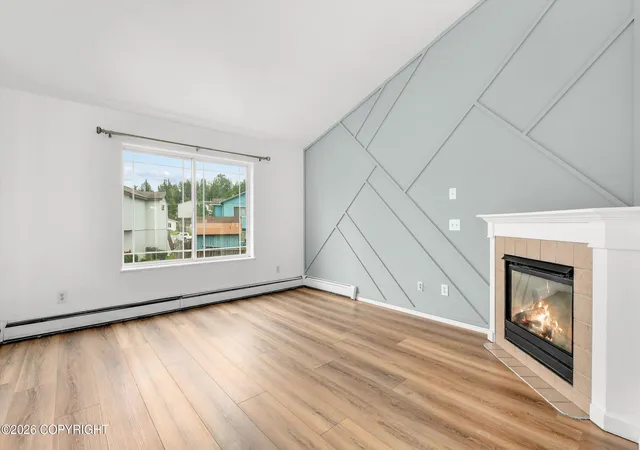 Photo 2 of Condo for sale at 119 Burton St #B, Anchorage, AK 99504 | MLS# 26-10579 | Listing updated on 2026-09-10