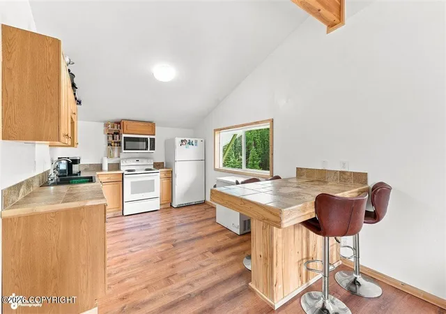 Photo 3 of Single family home for sale at 35070 Glacier Ave, Sterling, AK 99672 | MLS# 26-10678 | Listing updated on 2026-08-21