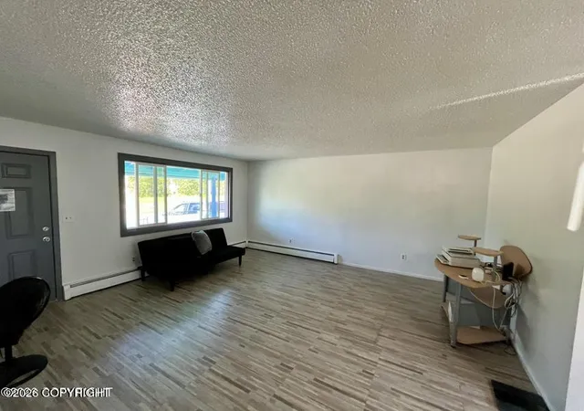 Photo 2 of Multi family home for sale at 4208 Mcphee Ave, Anchorage, AK 99508 | MLS# 26-10913 | Listing updated on 2026-08-25