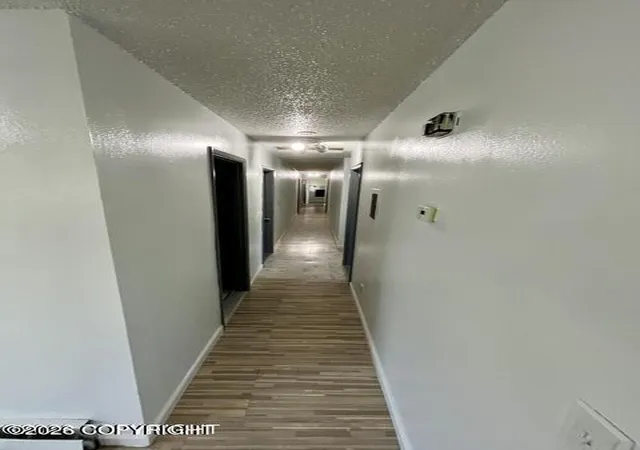 Photo 3 of Multi family home for sale at 4208 Mcphee Ave, Anchorage, AK 99508 | MLS# 26-10913 | Listing updated on 2026-10-07