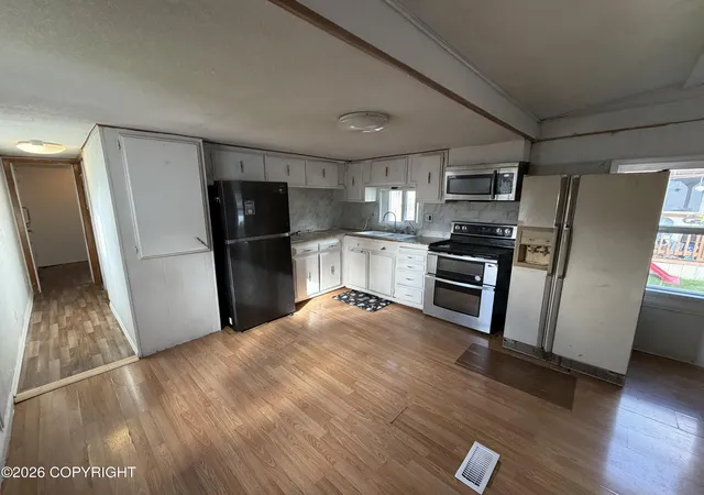 Photo 2 of Manufactured home for sale at 1200 Diamond Blvd #1019, Anchorage, AK 99515 | MLS# 26-10978 | Listing updated on 2026-08-29