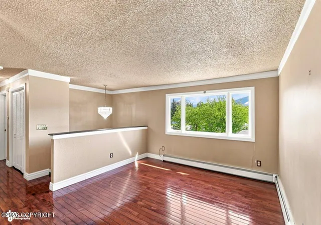 Photo 2 of Single family home for sale at 1826 Twining Dr, Anchorage, AK 99504 | MLS# 26-11202 | Listing updated on 2026-09-01