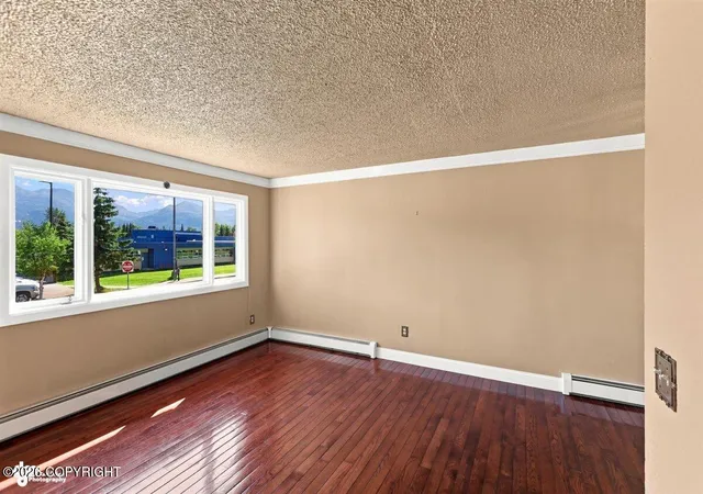 Photo 3 of Single family home for sale at 1826 Twining Dr, Anchorage, AK 99504 | MLS# 26-11202 | Listing updated on 2026-09-01