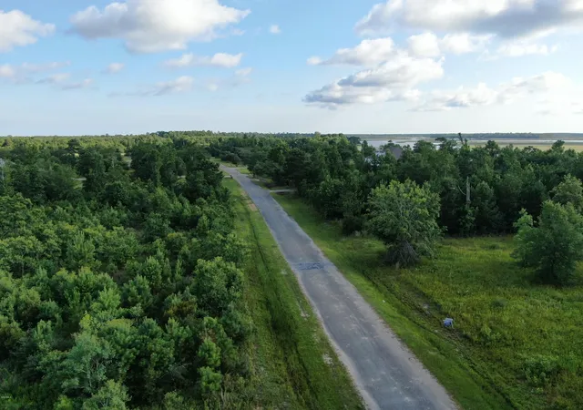 Photo 4 of Land for sale at 0 Jourdan Bluff Dr, Kiln, MS 39556 | MLS# 3351551 | Listing updated on 2026-03-30