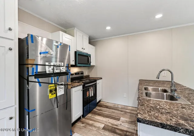 Photo 2 of Manufactured home for sale at 7729 Narcissus Dr, Gautier, MS 39553 | MLS# 4156132 | Listing updated on 2026-07-31