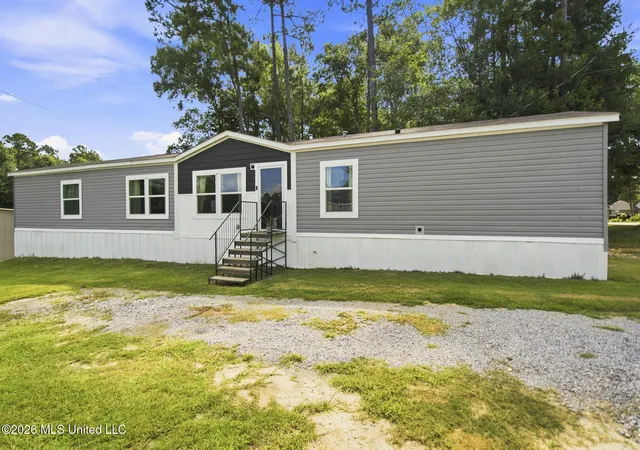 Photo 2 of Manufactured home for sale at 1063 Lilinoe Way, Diamondhead, MS 39525 | MLS# 4157883 | Listing updated on 2026-08-03