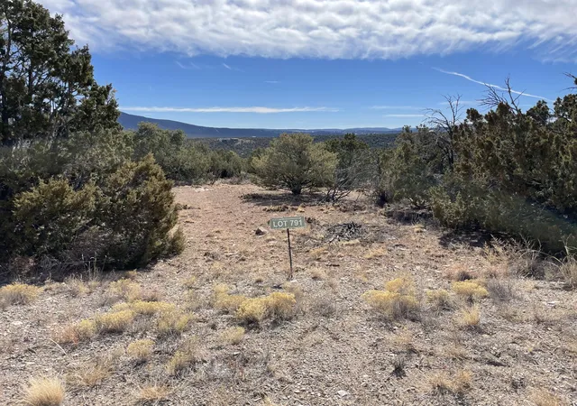Photo 1 of Land for sale at 99 Rain Dance Rd, Sandia Park, NM 87047 | MLS# 1007805 | Listing updated on 2026-07-21
