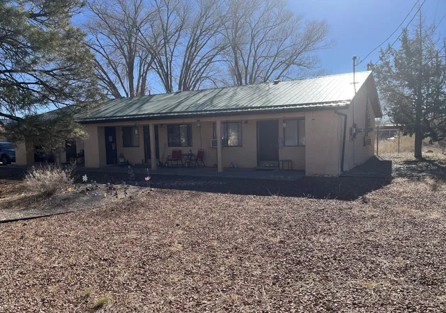 1st image of 1000 Sage St, Grants, NM 87020 | MLS# 1098300