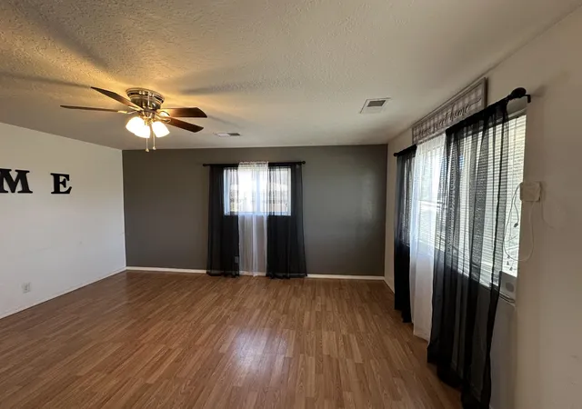 Photo 2 of Single family home for sale at 6209 Sunset Gdns Rd Sw, Albuquerque, NM 87121 | MLS# 1100695 | Listing updated on 2026-07-21