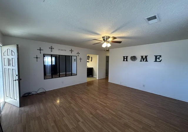 Photo 3 of Single family home for sale at 6209 Sunset Gdns Rd Sw, Albuquerque, NM 87121 | MLS# 1100695 | Listing updated on 2026-07-21