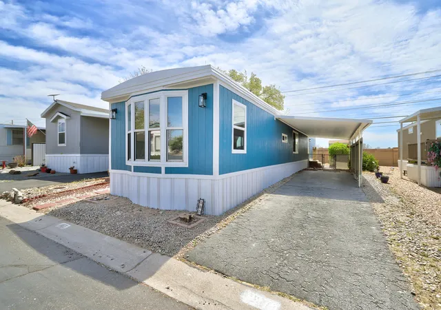 Photo 2 of Manufactured home for sale at 7112 Pan American NE #187, Albuquerque, NM 87109 | MLS# 1101017 | Listing updated on 2026-08-17
