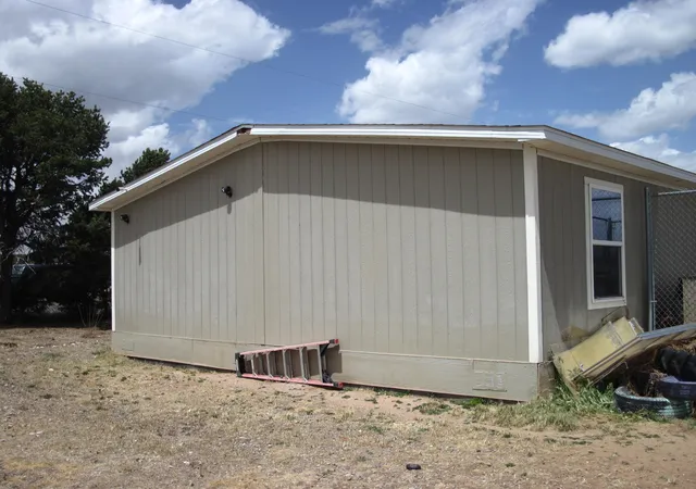 Photo 3 of Manufactured home for sale at 2 Miller Ln, Tijeras, NM 87059 | MLS# 1102609 | Listing updated on 2026-07-21