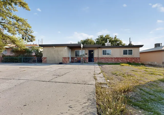 Photo 1 of Single family home for sale at 9716 Indian School Rd Ne, Albuquerque, NM 87112 | MLS# 1102895 | Listing updated on 2026-07-21