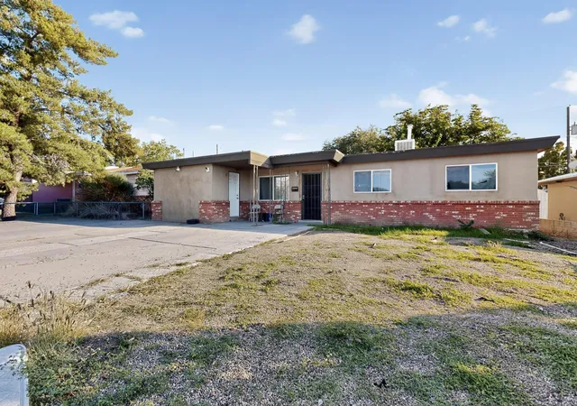 Photo 2 of Single family home for sale at 9716 Indian School Rd Ne, Albuquerque, NM 87112 | MLS# 1102895 | Listing updated on 2026-07-21