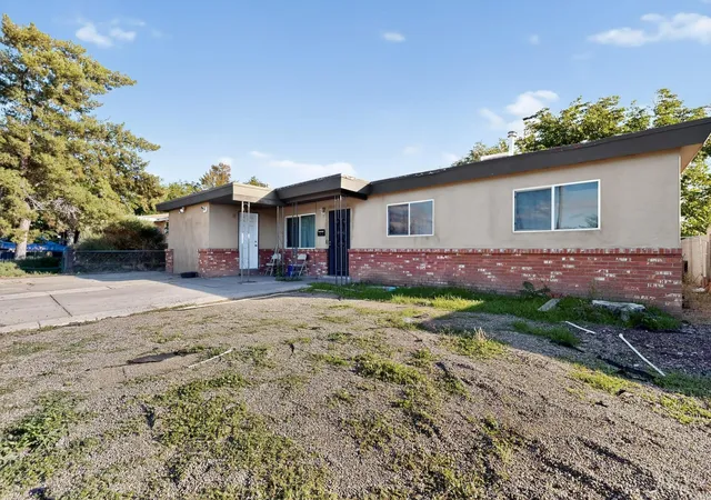 Photo 3 of Single family home for sale at 9716 Indian School Rd Ne, Albuquerque, NM 87112 | MLS# 1102895 | Listing updated on 2026-07-21