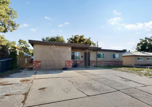 Photo 3 of Single family home for sale at 9716 Indian School Rd NE, Albuquerque, NM 87112 | MLS# 1102895 | Listing updated on 2026-07-21