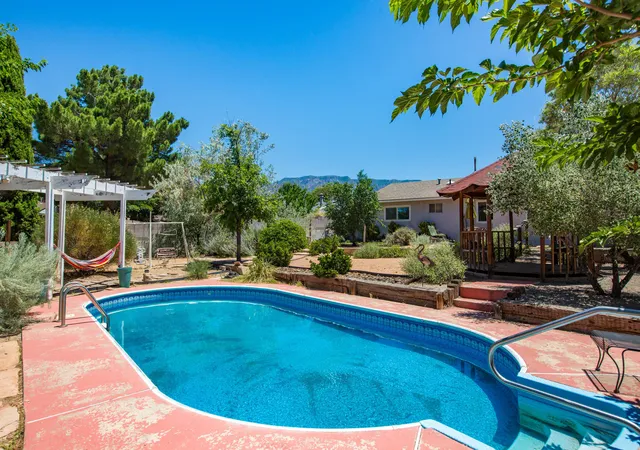 Photo 1 of Single family home for sale at 10405 Mazatlan Dr Ne, Albuquerque, NM 87111 | MLS# 1105385 | Listing updated on 2026-08-28