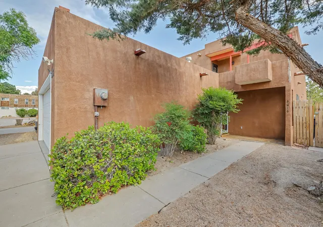 Photo 2 of Sale Pending at 6016 Whisperwood Ct Ne, Albuquerque, NM 87109 | MLS# 1105718 | Listing updated on 2026-08-21