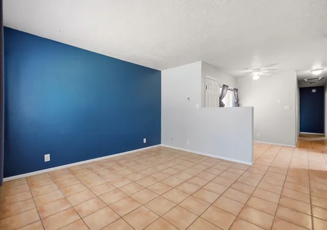 Photo 3 of Townhouse for sale at 6056 Kilmer Ave Nw, Albuquerque, NM 87120 | MLS# 1106523 | Listing updated on 2026-08-21