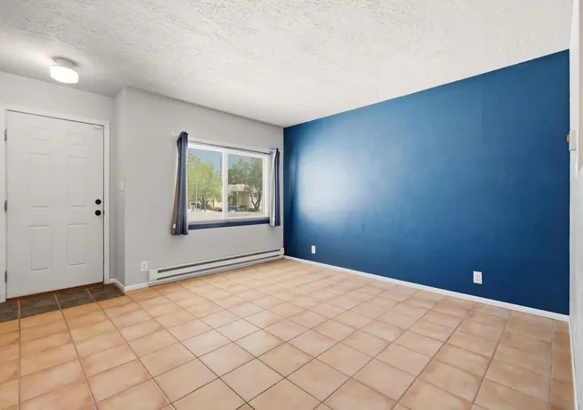 Photo 3 of Townhouse for sale at 6056 Kilmer Ave NW, Albuquerque, NM 87120 | MLS# 1106523 | Listing updated on 2026-08-21