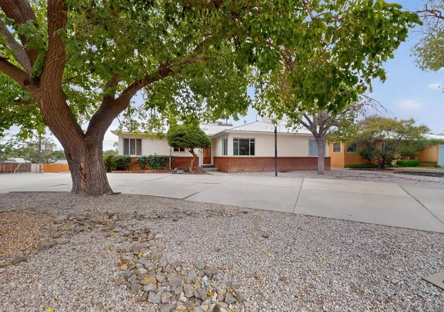 Photo 1 of Single family home for sale at 1401 Dartmouth Dr Ne, Albuquerque, NM 87106 | MLS# 1107905 | Listing updated on 2026-08-16