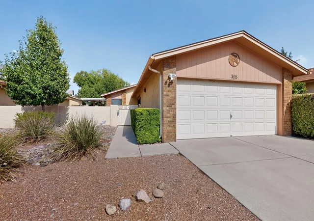 Photo 2 of Single family home for sale at 316 Palmer Park Dr Ne, Albuquerque, NM 87123 | MLS# 1109032 | Listing updated on 2026-08-19