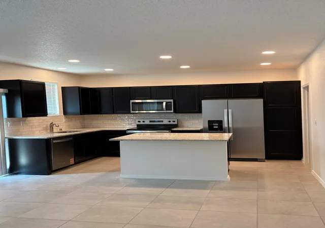 Photo 2 of Townhouse for sale at 8928 Mountain Ash Ave Sw, Albuquerque, NM 87121 | MLS# 1109372 | Listing updated on 2026-08-18