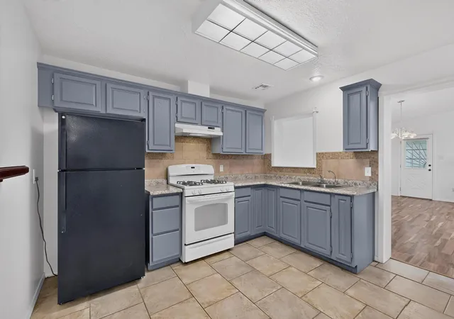 Photo 3 of Sale Pending at 1401 Vista Del Rio Rd Sw, Albuquerque, NM 87105 | MLS# 1109384 | Listing updated on 2026-08-22
