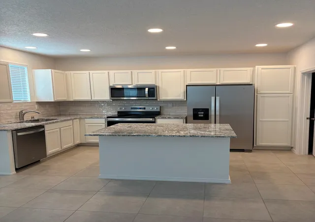 Photo 2 of Townhouse for sale at 8924 Mountain Ash Ave Sw, Albuquerque, NM 87121 | MLS# 1109497 | Listing updated on 2026-08-20