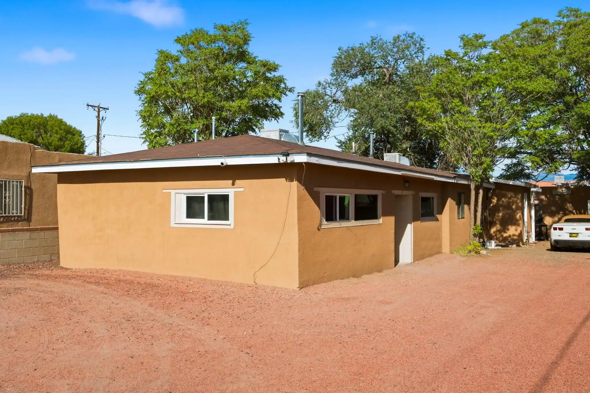 Photo 1 of Sale Pending at 142 55th Street Sw #A & B, Albuquerque, NM 87121 | MLS# 1111391 | Listing updated on 2026-10-14