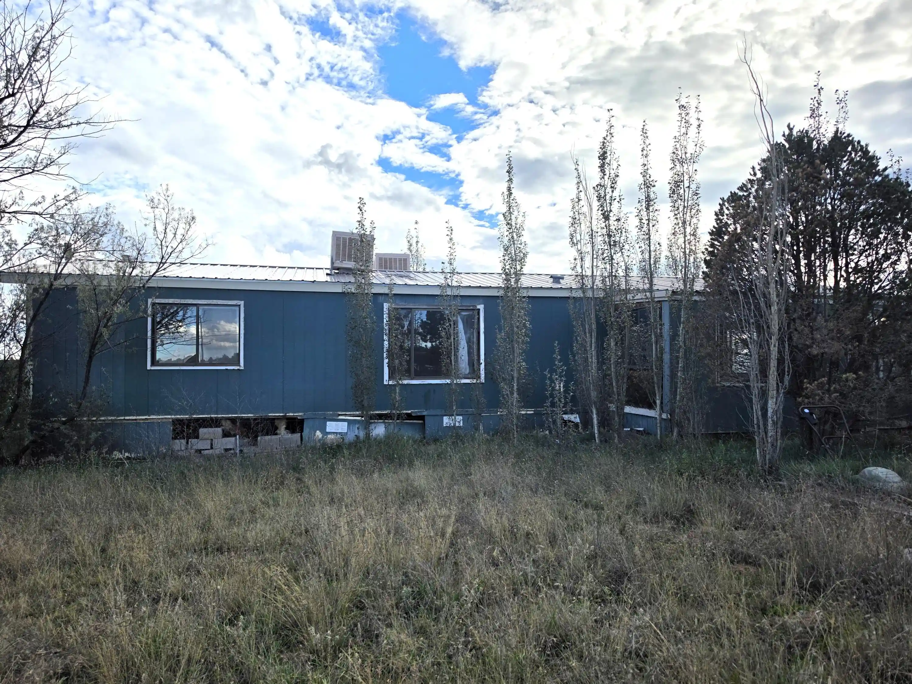 Manufactured home for sale at 13 Charlotte Ct, Edgewood, NM 87015 | MLS# 1112846