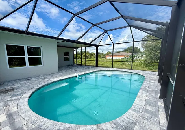 Photo 2 of Single family home for sale at 19092 Woodbine Ave, Port Charlotte, FL 33954 | MLS# C7509965 | Listing updated on 2026-09-08