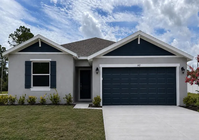 Photo 1 of Single family home for sale at 102 Point Pleasant Dr, Palm Coast, FL 32164 | MLS# O6409344 | Listing updated on 2026-09-06