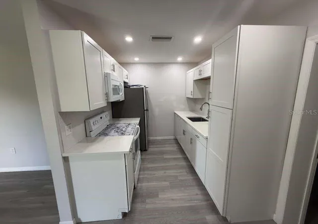 Photo 4 of Single family home for sale at 1402 4th Avenue NE, Ruskin, FL 33570 | MLS# A4701783 | Listing updated on 2026-10-08