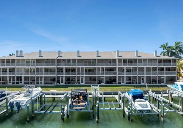 Townhouse for sale at 521 Pinellas Bayway S #105, Saint Petersburg, FL 33715 | MLS# TB8538921