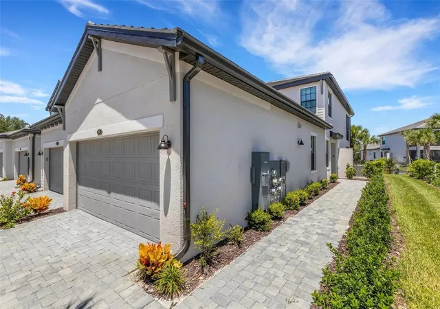Photo 1 of Townhouse for sale at 5624 Summit Pointe Cir #104, Bradenton, FL 34210 | MLS# A4703402 | Listing updated on 2026-10-07