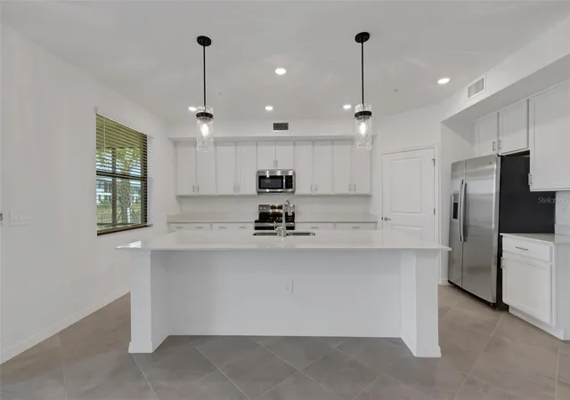 Photo 3 of Townhouse for sale at 5624 Summit Pointe Cir #104, Bradenton, FL 34210 | MLS# A4703402 | Listing updated on 2026-10-07