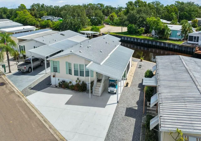 Photo 1 of Manufactured home for sale at 115 E Saint Annes Cir, Apollo Beach, FL 33572 | MLS# TB8541005 | Listing updated on 2026-09-04