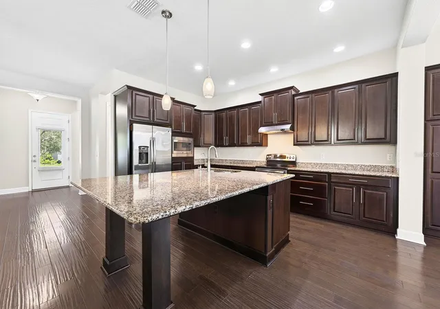 Photo 2 of Single family home for sale at 8130 Laureate Blvd, Orlando, FL 32827 | MLS# O6435568 | Listing updated on 2026-09-05