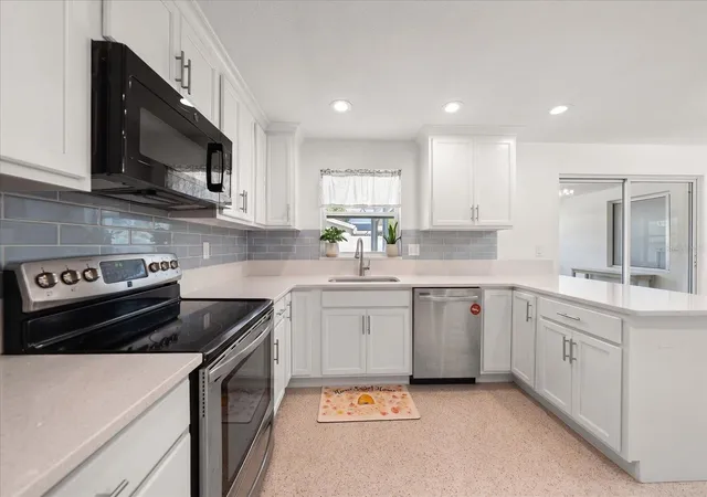 Photo 3 of Single family home for sale at 1690 Pinehurst Rd, Dunedin, FL 34698 | MLS# TB8542470 | Listing updated on 2026-10-13