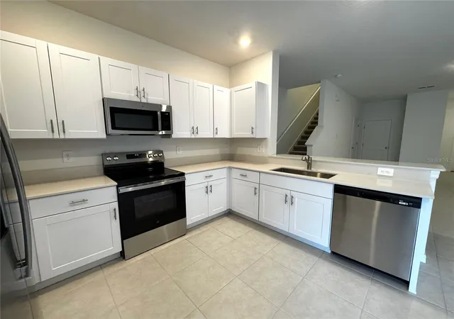 Photo 3 of Townhouse for sale at 10149 Trumpet Honeysuckle Way, San Antonio, FL 33576 | MLS# TB8543181 | Listing updated on 2026-10-07