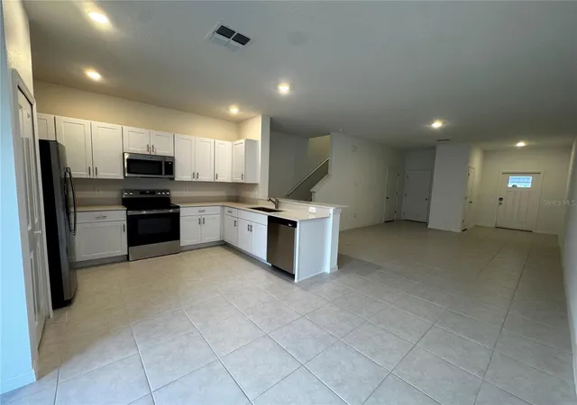 Photo 3 of Townhouse for sale at 10149 Trumpet Honeysuckle Way, San Antonio, FL 33576 | MLS# TB8543181 | Listing updated on 2026-10-07