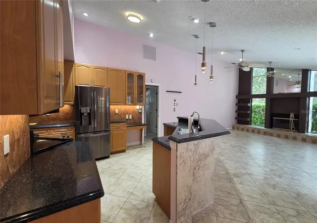 Photo 4 of Single family home for sale at 4080 Southern Manor Ct, Sarasota, FL 34233 | MLS# A4704288 | Listing updated on 2026-09-06
