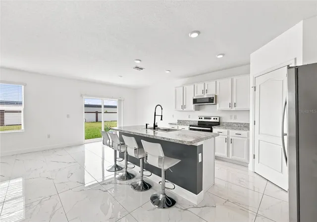Photo 3 of Single family home for sale at 583 Auburn Grv Ter, Auburndale, FL 33823 | MLS# S5156505 | Listing updated on 2026-09-01