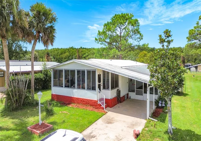 Photo 2 of Manufactured home for sale at 2614 Mc Daniel Dr, Kissimmee, FL 34758 | MLS# TB8543408 | Listing updated on 2026-09-06