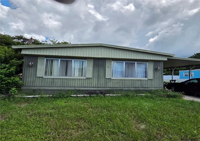 Photo 1 of Manufactured home for sale at 4122 Cardoon Dr, New Port Richey, FL 34653 | MLS# W7889017 | Listing updated on 2026-09-24