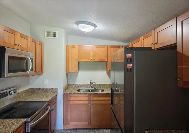 Photo 2 of Single family home for sale at 916 E 123rd Avenue, Tampa, FL 33612 | MLS# TB8543653 | Listing updated on 2026-09-02
