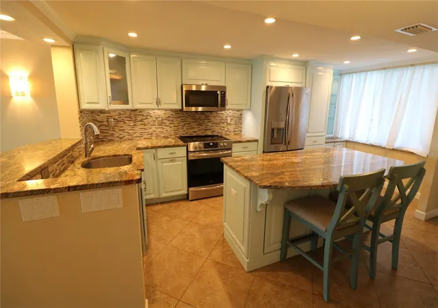 Photo 3 of Condo for sale at 9495 Blind Pass Rd #504, St Pete Beach, FL 33706 | MLS# TB8543732 | Listing updated on 2026-09-06